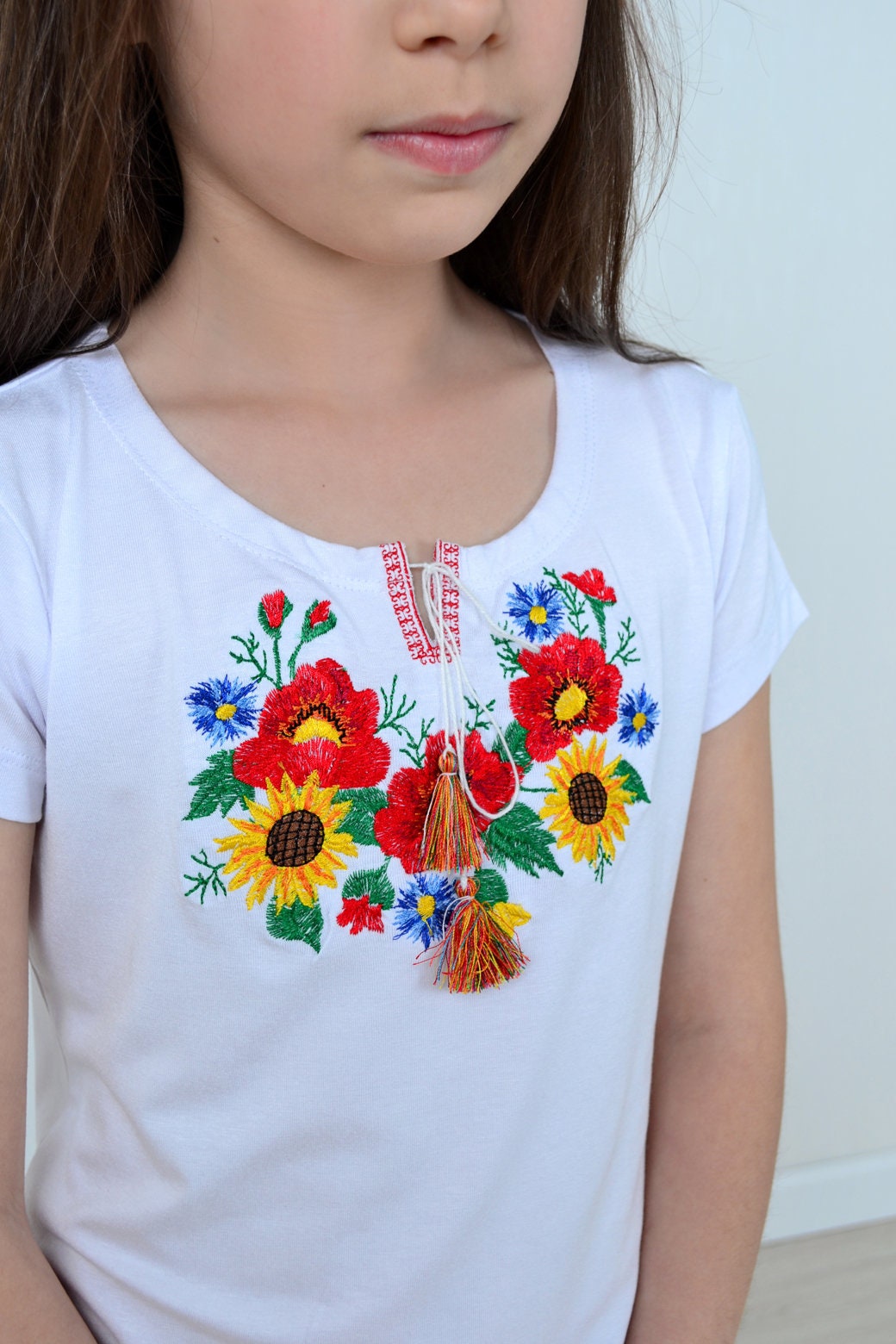 Size 104. Girl's White Embroidered T-Shirt with Floral Design – Ukrainian Folk Top with Tassels